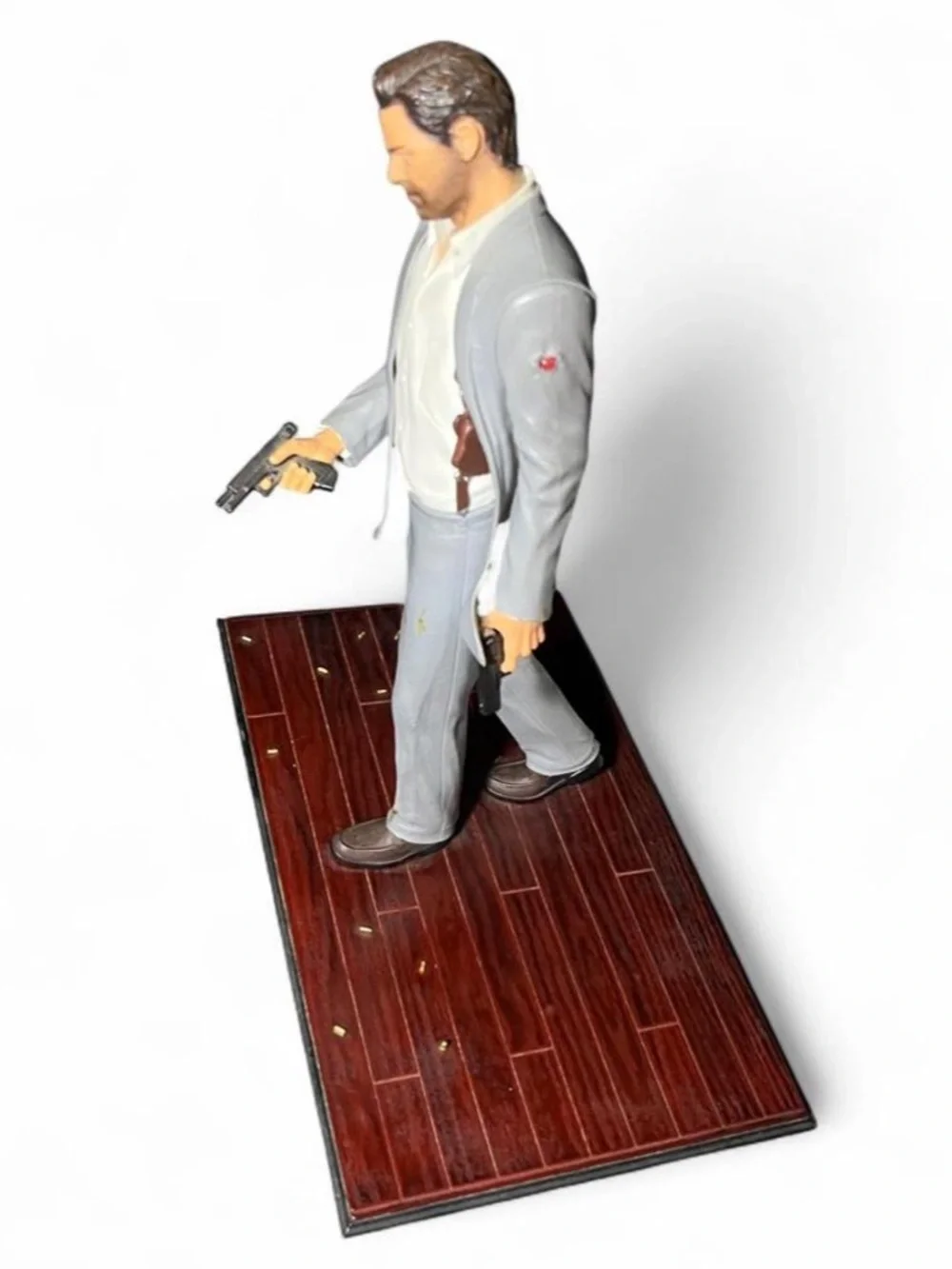 Collector Action Figure in Light Gray Suit with Dual Pistols